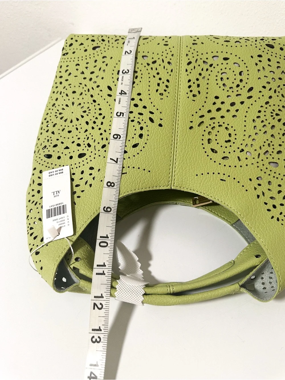 Anthropologie Melie Bianco Perforated Hand Bag in Green NWT